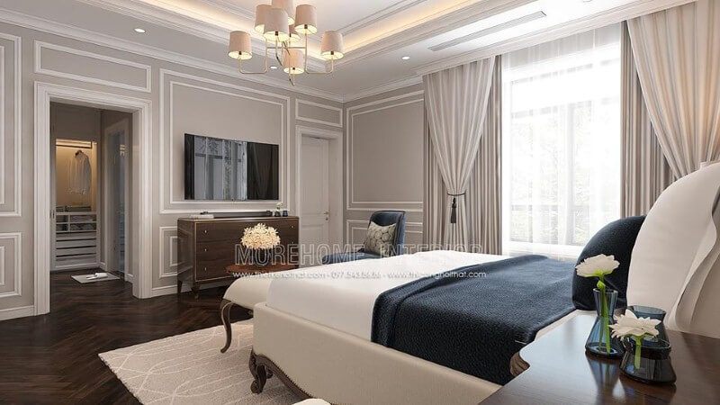 Trang trí nội thất phòng ngủ tân cổ điển có tủ quần áo đối diện giường ngủ khoa học, phong thủy.