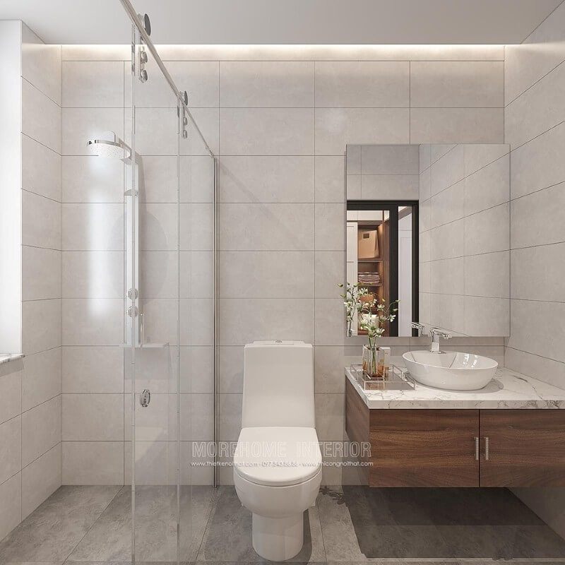 Morehome giới thiệu một mẫu thiết kế phòng tắm sang trọng với sự kết hợp giữa các tone màu trầm và những đồ trang trí tinh tế như gương, vách tắm kính cửa trượt, tủ mặt đá vân mây. Ngoài ra, còn có nhiều ý tưởng độc đáo khác để quý vị tham khảo thêm tại website: thietkenoithat.com.